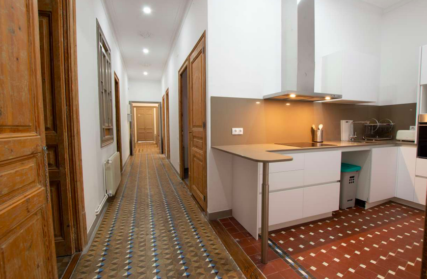 Jump In Balmes — Kitchen and hallway — breakfast bar and mosaic tiles
